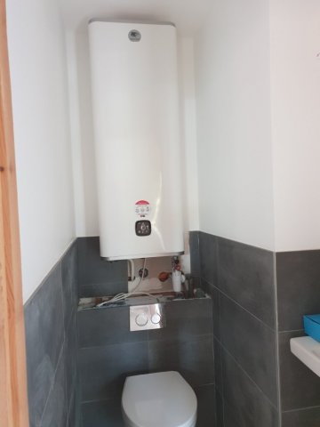 POSE ET INSTALLATION D' UN CHAUFFE EAU ELECTRIQUE DANS UN CHALET AUX DEUX ALPES 